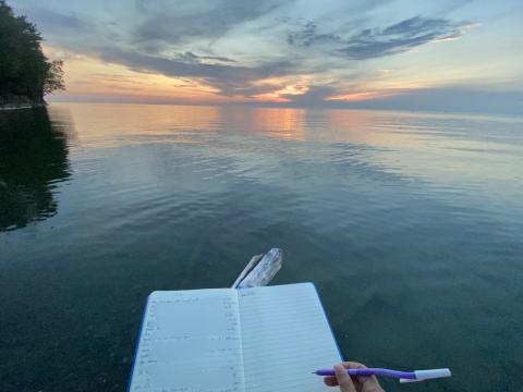 journal open at lake